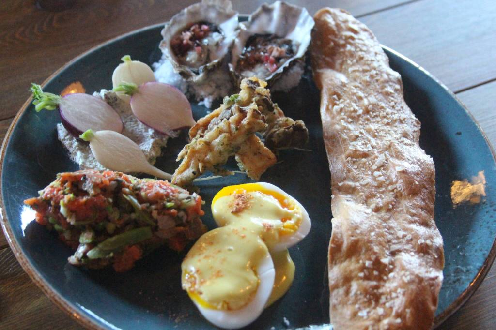 Photo by Marina Blatt
The PNW Relish Tray of Dreams contained miyagi oysters with rhubarb mignonette, radishes on seaweed butter, crispy Dog Island mushrooms and more.