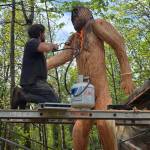 Photo provided. Kyle Christopherson finished the massive sculpture with a propane wood torch  essentially painting the wood with fire to seal it and give it a tan.