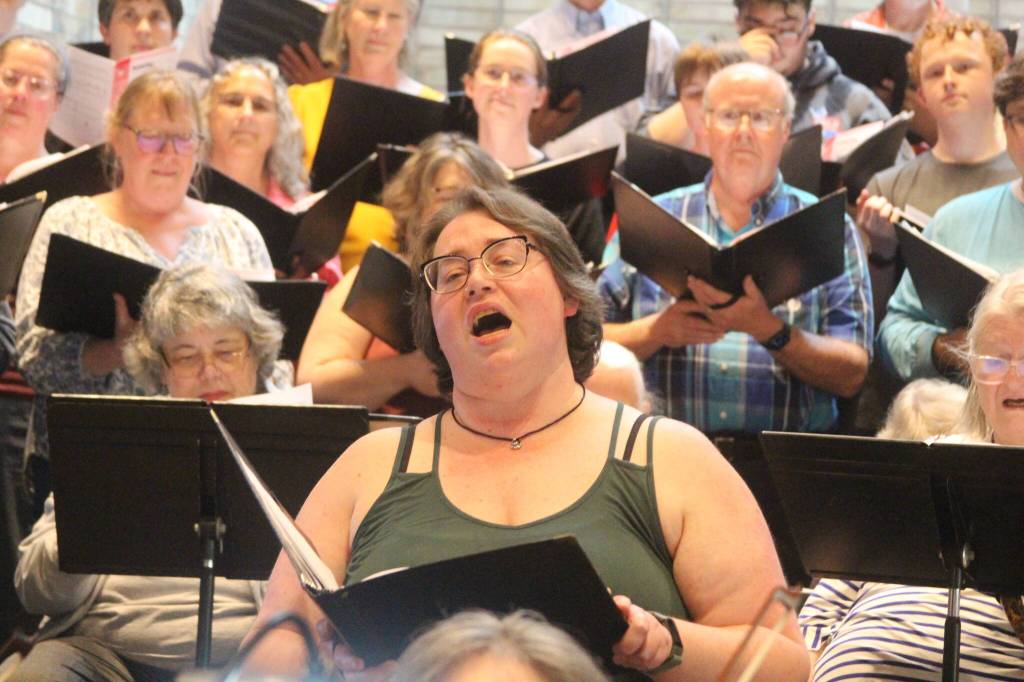 Photos by Marina Blatt
Guest soloist Eva Nelson, who has performed professionally throughout the Seattle and Portland areas, said the emotional connection between performers and the music is what makes live music unforgettable.