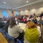 Photo by Jessie Stensland. Residents packed into the Holmes Harbor Sewer District meeting to ask questions about the golf course.