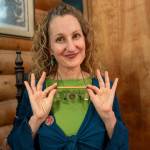 Photo by David Welton. Dr. Odd shows off the necklace her sister crafted for her. The duo said what most people might think of as a costume is a really cute everyday outfit for them.