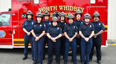 Photo provided. Eleven recruits graduated from the academy and nine of them  all but Tyrone David and Kyler Wallen  are pictured here.