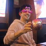 (Photo by Marina Blatt) Watching Love Island USA has always been something Nick Sanabria did at home. After wondering whether the show might be even more fun with company, he posted about the idea on Facebook. His plan to organize a watch party quickly took shape.