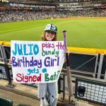 Photo provided by Sara Arrington. Lilly Arrington received a signed bat from her favorite Seattle Mariners player at a game on Aug. 2.